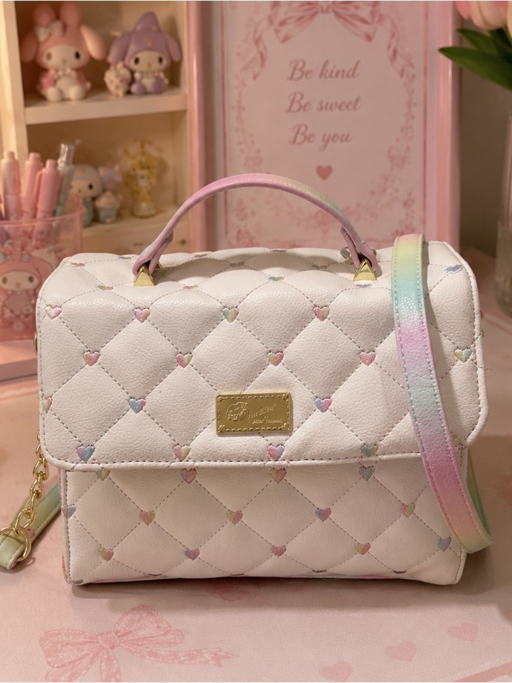 Betsey Johnson White Quilted Crossbody with Pastel Rainbow Strap
